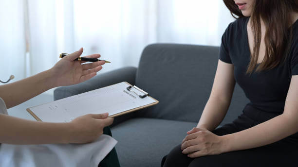 Professional psychiatrist explaining diagnosis, giving advice to patient. Mental health and psychotherapy concept.